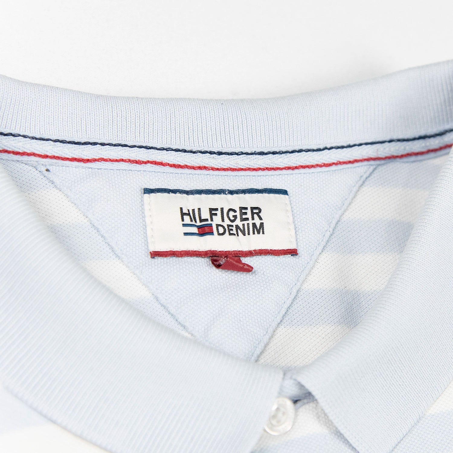 Polo Tommy Hilfiger con righe orizzontali e logo ricamato sul petto