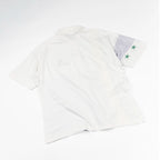 Polo vintage Sergio Tacchini vista frontale con stampa geometrica e logo sul petto