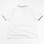 Retro della polo Reebok vintage con fondo bianco e dettagli sportivi